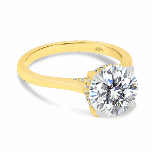 Hattie Round 9 0 Angled Yellow Gold Moissanite 4 Prong Accented Under Rail Bridge Tapered Engagement Ring