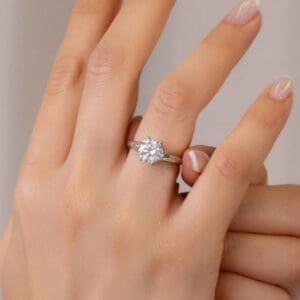 Model Wears Lily 8 0 White Gold Diamond 6 Prong Split Band Flower Design Solitaire Ring Blog Post