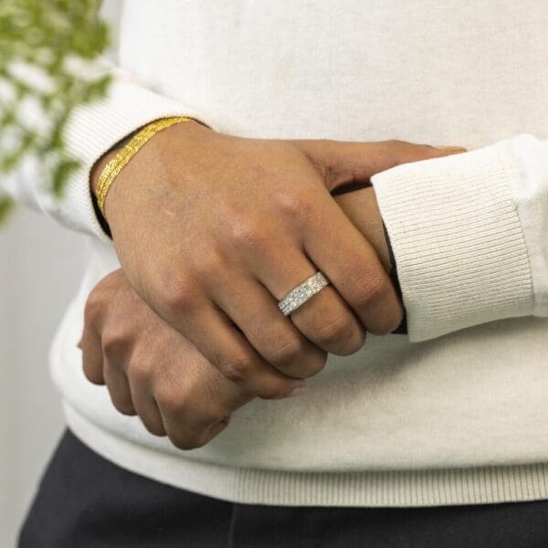 Model wears Alex ring double row lab grown diamond custom band