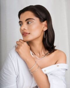 Woman Wears Leah Lab Grown Diamond Tennis Necklace. 